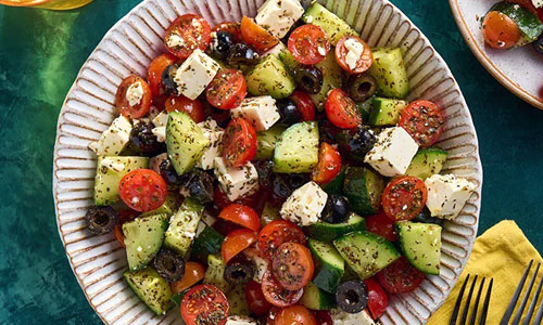 A large bowl of fresh Greek Salad with feta